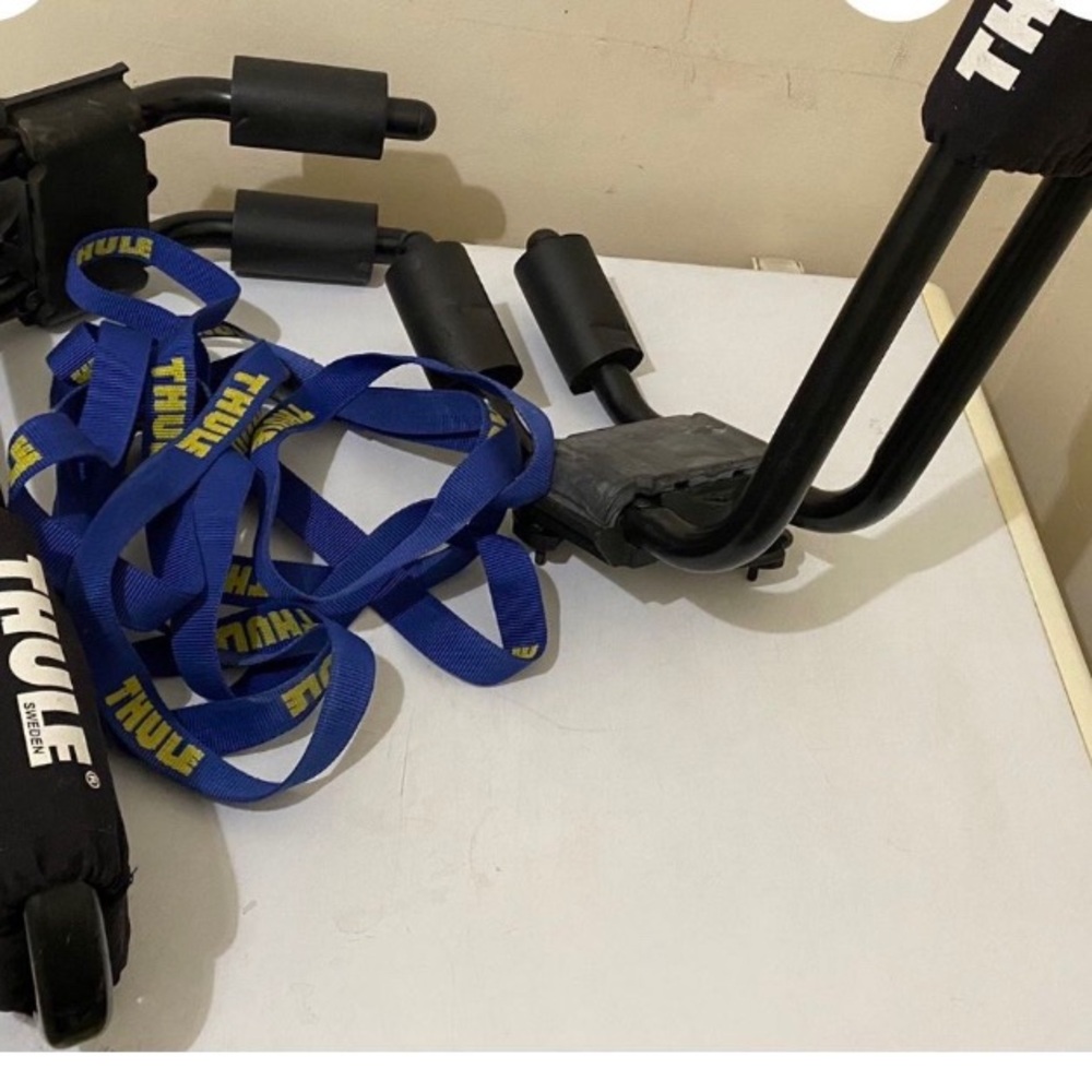 Thule kayak rack for on top of car with strap
